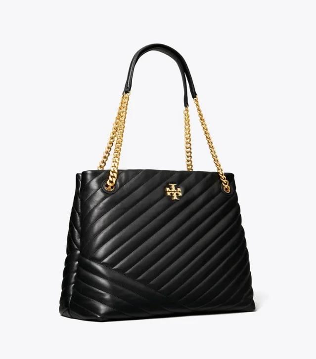 Tory Burch Kira Chevron Tote in black chevron-quilted leather with chain shoulder straps