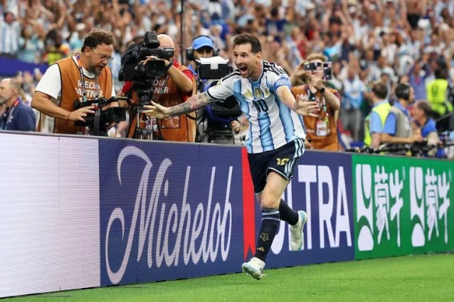 Messi celebrates his second goal against Austria