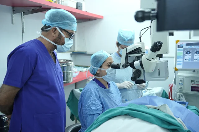 Eye surgery being performed in a hospital operating room