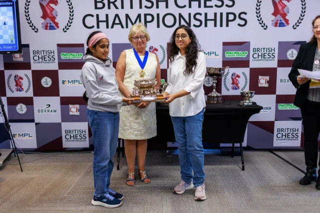 Bodhana Sivanandan and Trisha Kanyamarala with the championship trophy after the playoff