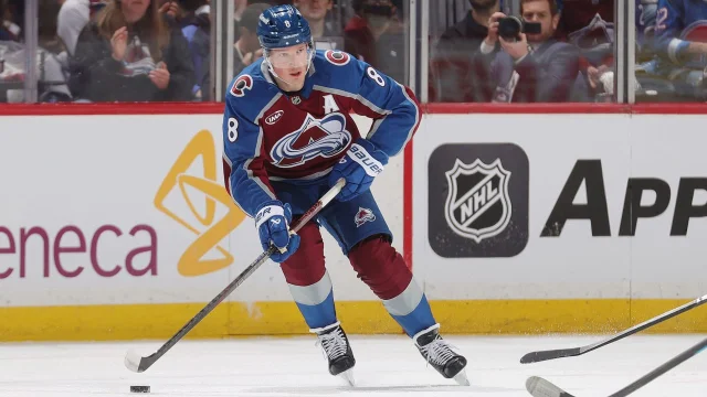 Cale Makar of the Colorado Avalanche carries the puck during a game