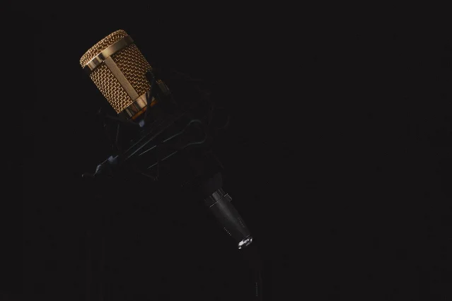 Professional podcast microphone in a recording studio setup