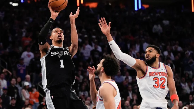 Wembanyama drives past Knicks defenders including KAT in Game 3 at MSG