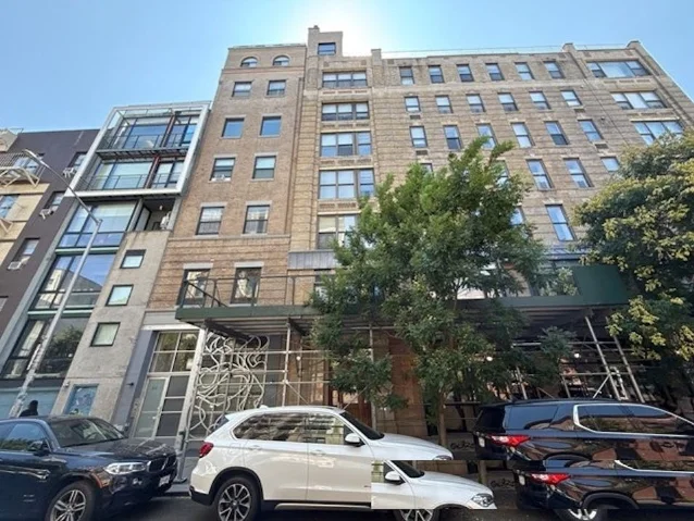 Exterior of 209 E 2nd St condo building, East Village, Manhattan — active Auction.com REO