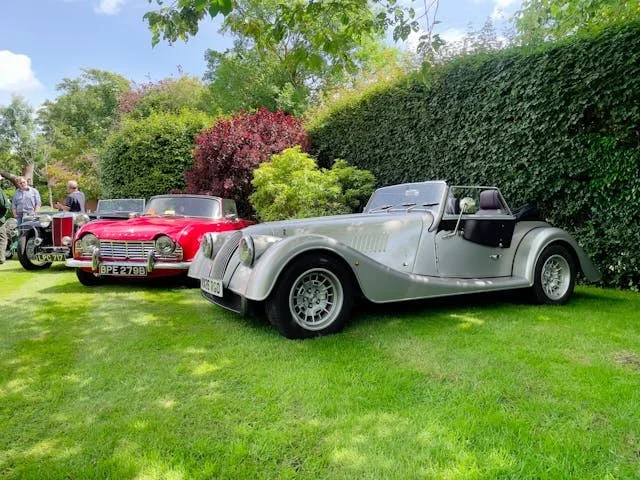 2026 Morgan Plus Four at a garden gathering
