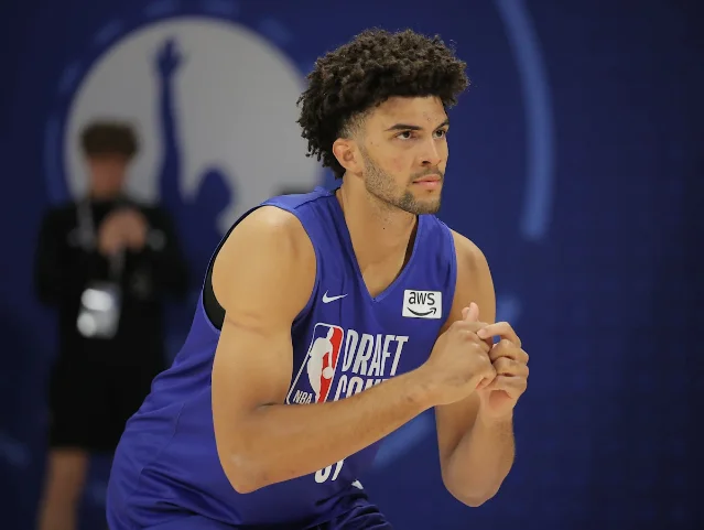 Cameron Boozer at the 2026 NBA Draft Combine in blue NBA Draft Combine gear