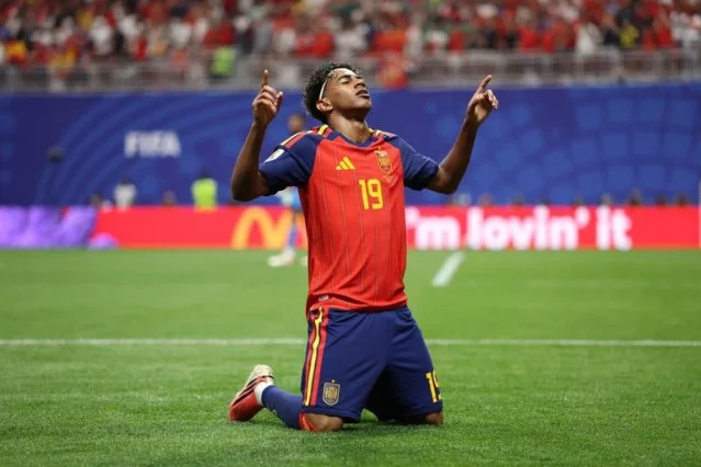 Lamine Yamal celebrates Spain's opener