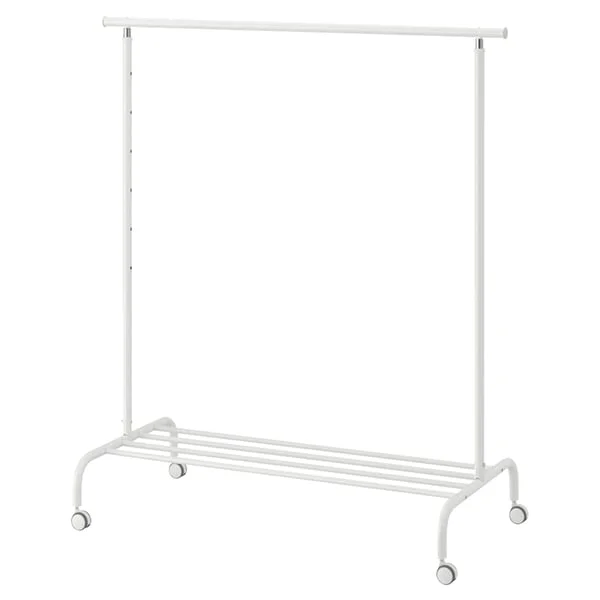 White freestanding garment rack with a hanging bar, wheels, and a low storage shelf.