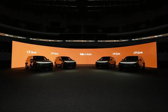 Four Li L9 Livis vehicles on stage at the Uzbekistan launch