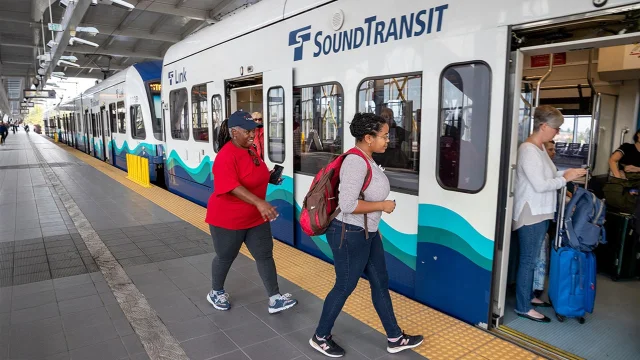 Passengers boarding Sound Transit Link light rail