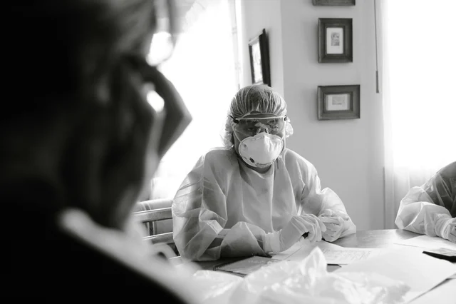 Healthcare workers in PPE during public health outbreak response