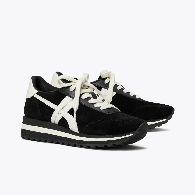 Tory Burch Hank Wedge Sneaker in black leather and suede with a cream EVA wedge sole