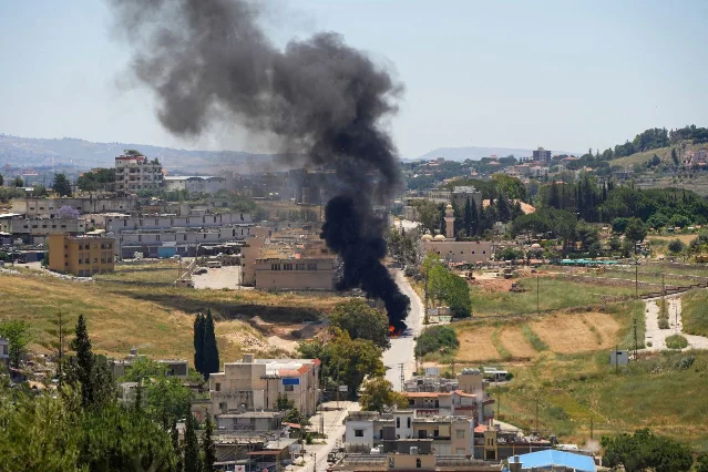 Black smoke billows following an Israeli strike as seen from Nabatieh, Lebanon, June 5, 2026