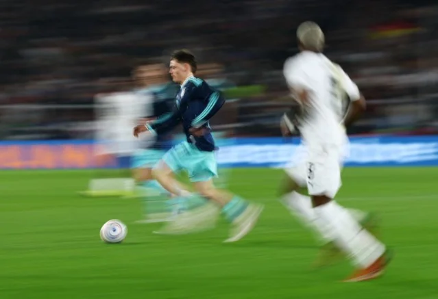 Florian Wirtz in action against Ghana in a March 2026 friendly, in Germany training colors