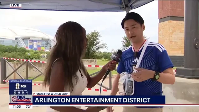 Japanese news anchor Hirochika Nakakuki reacts at the World Cup