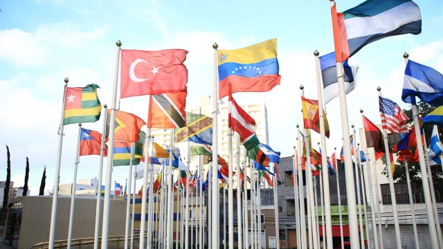 International flags at a diplomatic gathering — Asia's premier security forum opens in Singapore on May 29 with China notably absent at ministerial level