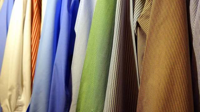 Row of shirts arranged by color