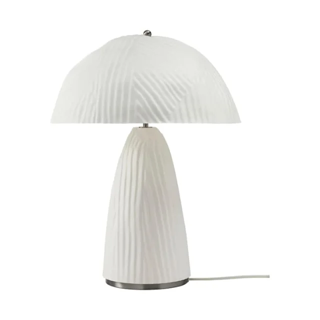 VINDKRAFT table lamp on a retail shelf display — dome lamp mounted on a tiered stand in an in-store styling vignette