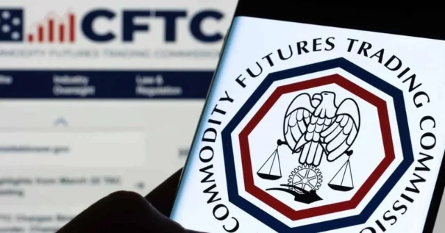 CFTC seal displayed on a smartphone screen with cftc.gov visible in background