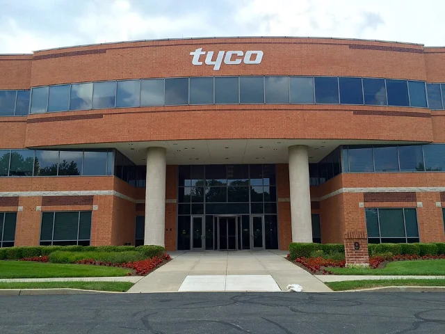 Tyco International headquarters in West Windsor, New Jersey — the brick building with white Tyco lettering that Ed Breen moved operations to from Manhattan in 2002