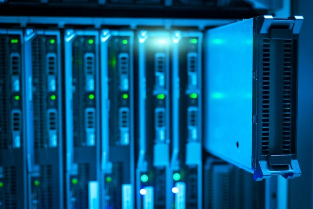 Server racks in a modern data center, powering the AI infrastructure buildout that drives Nvidia's revenue