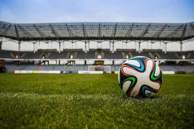 A football in an empty stadium ahead of a World Cup match