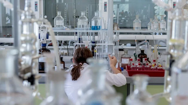 A pharmaceutical researcher at work in a laboratory