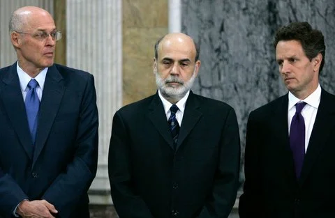 Henry Paulson, Ben Bernanke, and Timothy Geithner at a press conference during the financial crisis, 2008
