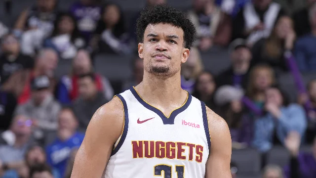 Spencer Jones in a Denver Nuggets uniform during a game