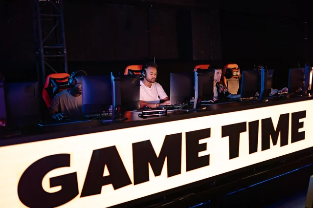 Esports arena stage with blue LED lighting and competition setup