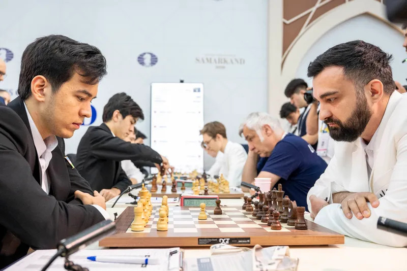 Nodirbek Abdusattorov at the board against Igor Kovalenko