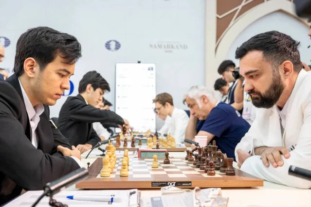 Nodirbek Abdusattorov at the board against Igor Kovalenko