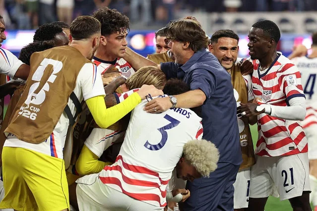 Mauricio Pochettino, Head Coach of the United States, celebrates with Gio Reyna after the team's victory over Paraguay at Los Angeles Stadium on June 12, 2026
