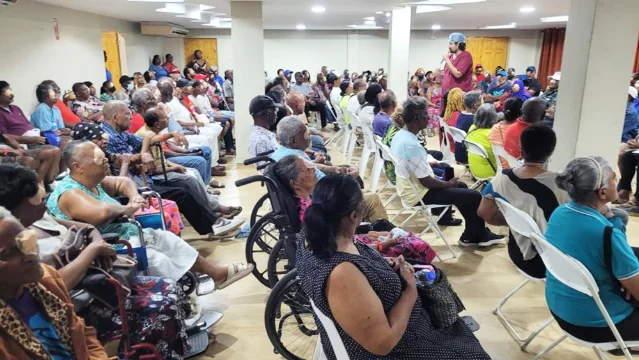 Patients wait inside the Community Hospital of Seventh-day Adventists during the eye-surgery mission.