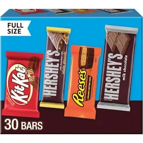 A 30-count Hershey's variety pack box showing Kit Kat, Hershey's with almonds, Reese's and Hershey's milk chocolate full-size bars, with "FULL SIZE" and "30 BARS" printed on the box.