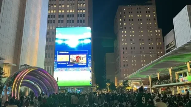 Mexican fans watch the match in downtown Dallas