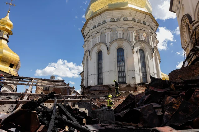 Ukrainian firefighters on the damaged Dormition Cathedral roof, Kyiv Pechersk Lavra, June 15 2026