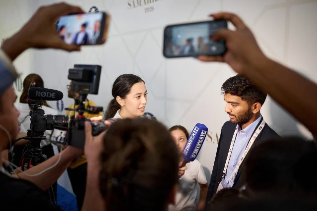 Gukesh Dommaraju being interviewed after his round-three win