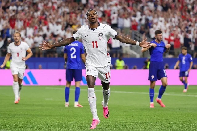 Marcus Rashford celebrates England's fourth goal