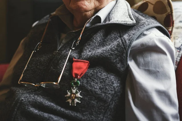 Joe Picard, 100-year-old D-Day veteran, wearing his military medals