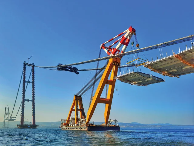 Deck segment being lifted by the Asian Hercules III floating crane, August 2021