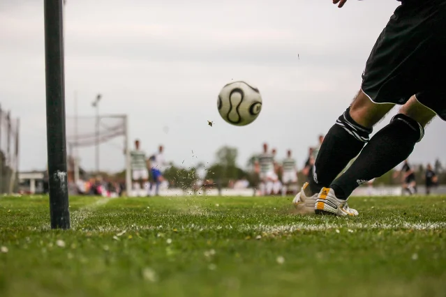 Soccer ball in flight toward a goal net — the finishing weapon the USMNT finally has in depth