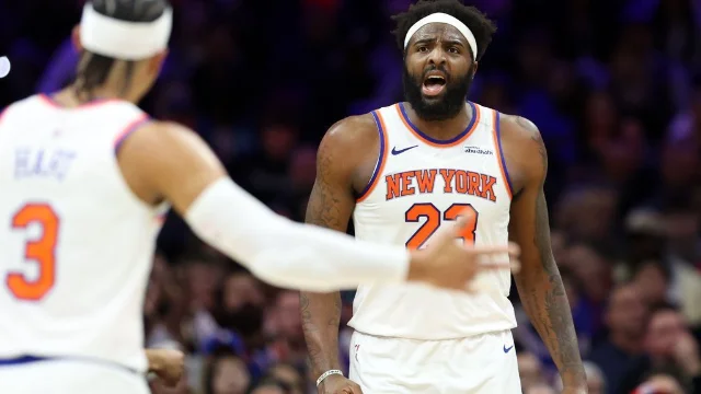 Mitchell Robinson (23) celebrating with Josh Hart during the Knicks' Eastern Conference Finals run
