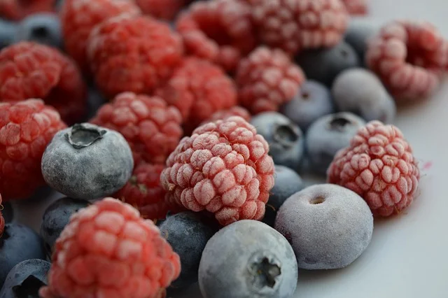 Frosted raspberries and blueberries