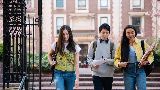 Students walking across a campus