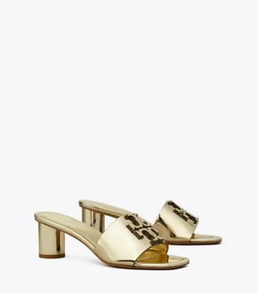 Tory Burch Ines Heeled Mule in metallic gold, angled product view