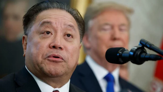 Hock Tan speaks in the Oval Office as President Trump listens, November 2017