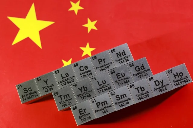 17 rare earth element blocks arranged on Chinese flag background