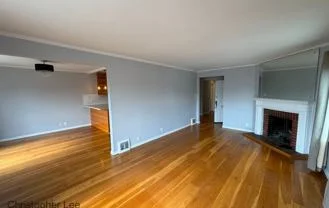 Hardwood floors and fireplace in 1450 Pacheco St living room