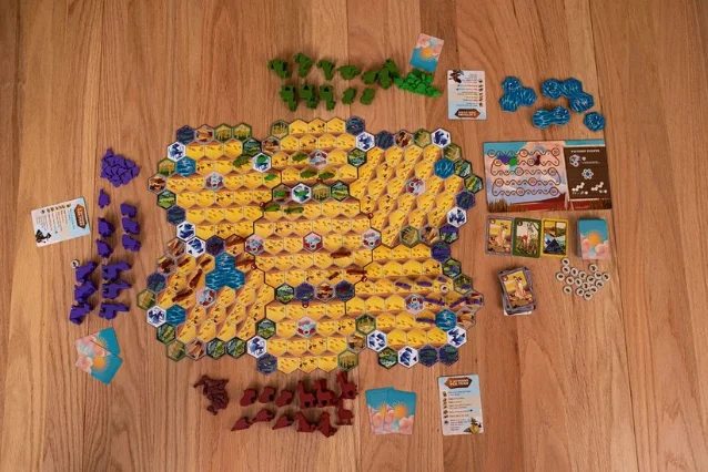 Hacienda 2026 tabletop layout with hex map, cards, and animal meeples